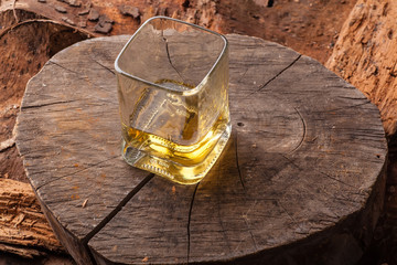 Whiskey on tree stump
