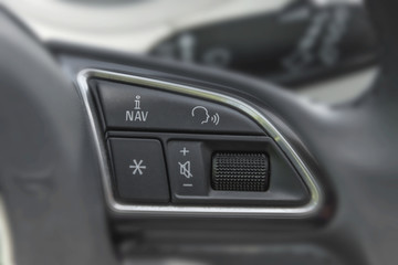 Fototapeta na wymiar Steering wheel commands in modern luxurious car