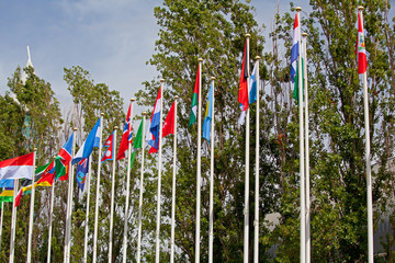 Fototapeta na wymiar Flags of the world happily blowing in the wind .