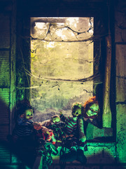 Creepy dolls by the window