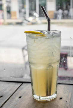 Cold soda lemonade on table