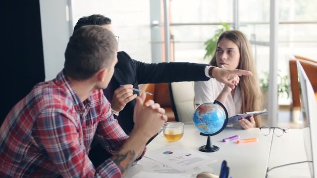 office workers with a globe. international business theme