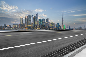 Fototapeta premium cityscape and skyline of shanghai from empty asphalt road
