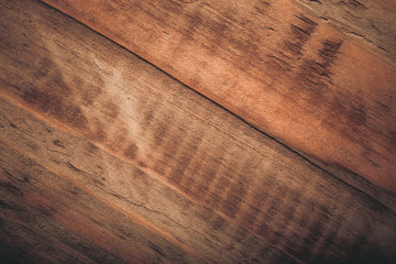 Wooden burned rustic texture for background. Rough weathered wooden board. Toned