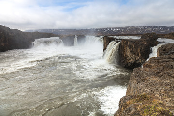 The Godafoss Waterfall - beautiful part of stony rocky desert landscape of Iceland