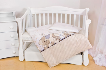 Fototapeta na wymiar Baby room bedding crib