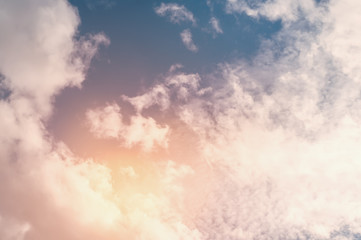 Beautiful light clouds at sunset, textured background.