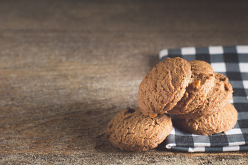  Cookies placed on fabric On old wooden floor