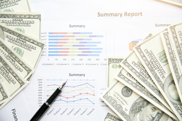 Financial problem with summary report and banknote. Financial concept.