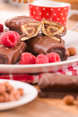 Chocolate rolls with hazelnuts and raspberries.