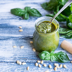 pesto sauce with raw ingredients. Basil pesto sauce