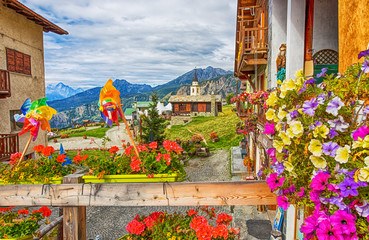 View of the picturesque village of Chamois, in Val D'Aosta, Italy. Its peculiarity is that cars are...