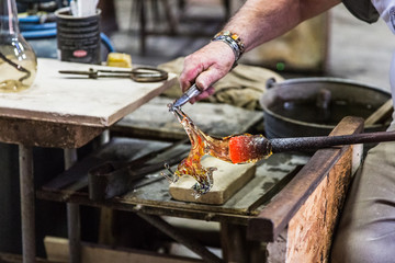 Making a glass horse. Murano glass.