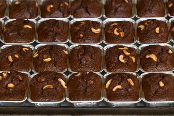 Thai bakery method baking chocolate brownie cake in pan