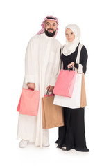 muslim couple with shopping bags