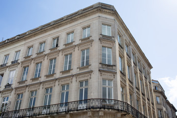 Fototapeta na wymiar Facade of a residential block of apartments in Paris, France