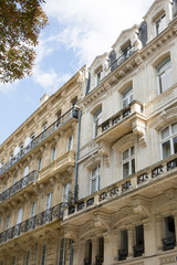 Facade of an old classic mansion in the city of Bordeaux, France