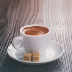 classic double espresso on wood table