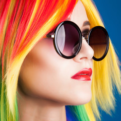 beautiful woman wearing color wig and sunglasses