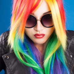 beautiful woman wearing color wig and sunglasses