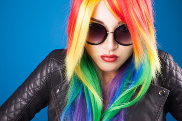 beautiful woman wearing color wig and sunglasses