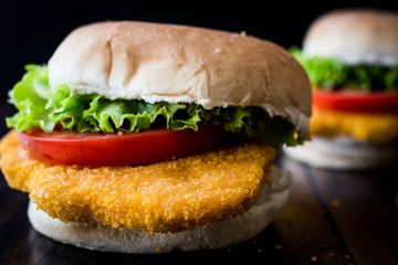 Chicken Burger with tomatoes and lettuce.