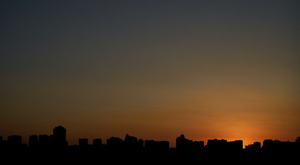 Fototapeta na wymiar Beautiful Silhouette Sunset over the Baku city, Azerbaijan