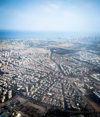 View of Tel Aviv and the Mediterranean Sea from the window of the plane taking off from the airport Ben Gurion