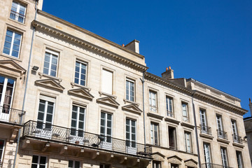Fototapeta na wymiar Traditional French Architecture with Typical Windows and Balconies in Paris, France. Haussmann renovation