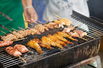 Grilled chicken wings, grilled chicken roasts are grilled on a steel grate, heated using wood and charcoal as fuel. Cooking this way May cause the formation of carcinogen.