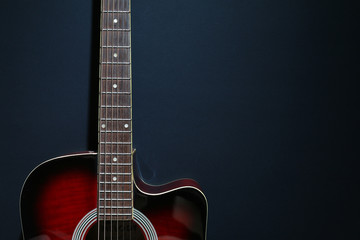 Obraz na płótnie Canvas Guitar body against black background