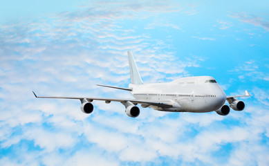 passenger airplane in the clouds. travel by air transport