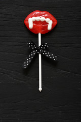 vampire lollipop on the black background