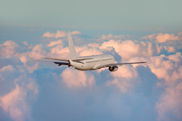 passenger airplane in the clouds. travel by air transport