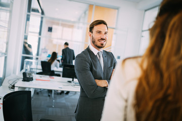 Portrait of architects having discussion in office