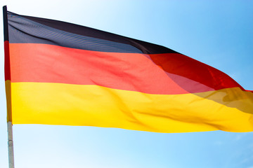 Flag of Germany against the blue sky