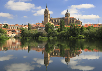 Salamanca Old and New Cathedrals reflected on Tormes River
