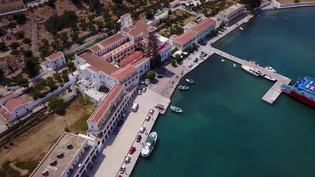 August 2017: Aerial drone video of iconic Archangel Michael of Panormitis bay in island of Symi, Dodecanese, Aegean, Greece
