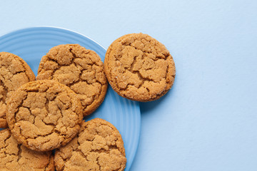 Ginger sparkle cookies on plate. Top down view.