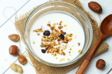 nuts yogurt in glass bowl