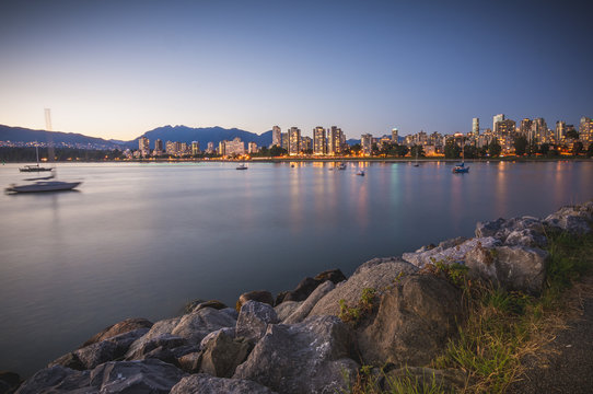 Vancouver skyline at blue hour  as seen from Kitsilano beach