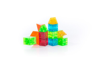 Clear plastic color blocks - toys isolated on white background