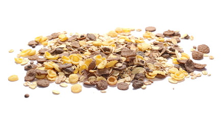 Crunchy chocolate muesli pile isolated on white background