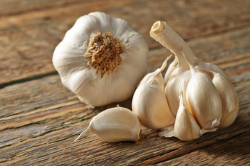 Garlic on wooden table.