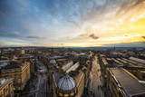 High angle view of Grey Street amidst city against cloudy sky during sunset
