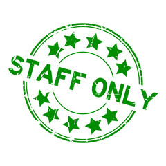 Grunge green staff only with star icon round rubber seal stamp on white background