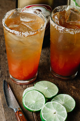 Brunch Micheladas in tall glasses with salted rim