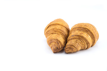 two croissant on white background