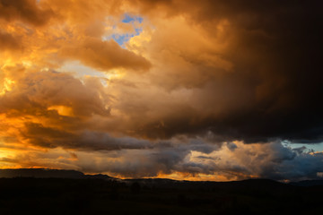 Dark storm clouds before rain at sunset. cloud on sunse