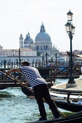 A gondolier at work in Venice
